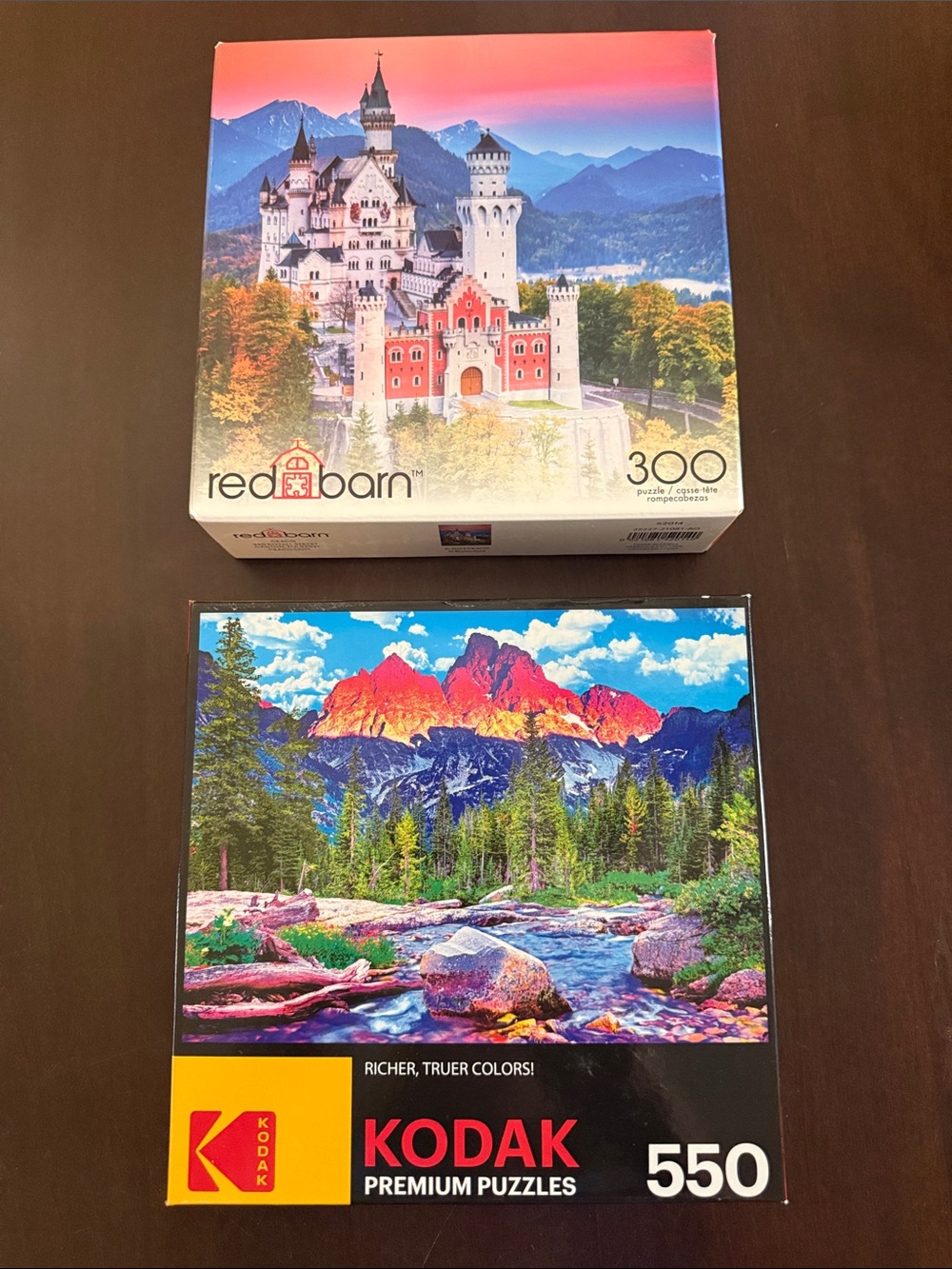 TWO puzzles!!NEW in box! Kodak Grand Tetons 550 pieces. Red Barn Bavaria 300 pc.